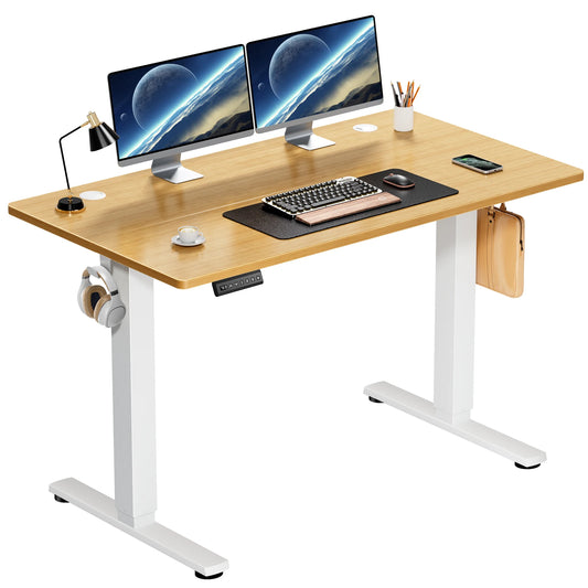 Height-adjustable standing desk with bamboo top and white frame.